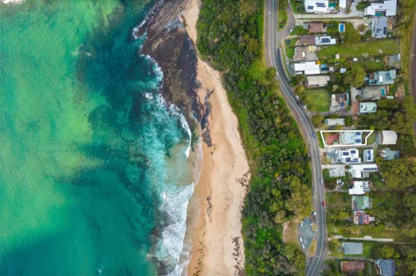 The Austinmer home spans three levels and sits on 707 square metres