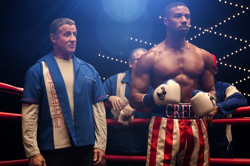 Sylvester Stallone, left, and Michael B. Jordan in "Creed II." MUST CREDIT: Barry Wetcher, Metro Goldwyn Mayer Pictures/Warner Bros. Pictures