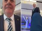Ex-Australian treasurer Peter Costello filmed shirt-fronting a journalist.