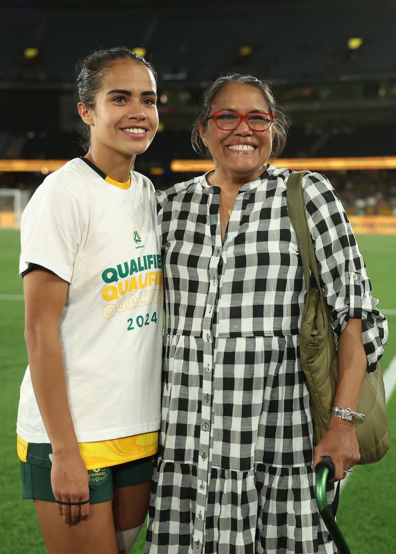 MELBOURNE, AUSTRALIA - FEBRUARY 28: Mary Fowler of Australia and former Australian runner Cathy Freeman pose after the AFC Women's Olympic Football Tournament Paris 2024 Asian Qualifier Round 3 match between Australia Matildas and Uzbekistan at Marvel Stadium on February 28, 2024 in Melbourne, Australia. (Photo by Robert Cianflone/Getty Images)