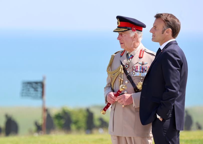 VER-SUR-MER, FRANCE - JUNE 06: King Charles III and President of France, Emmanuel Macron during the UK Ministry of Defence and the Royal British Legion’s commemorative event at the British Normandy Memorial to mark the 80th anniversary of D-Day on June 06, 2024 in Ver-Sur-Mer, France. Normandy is hosting various events across significant sites such as Pegasus Bridge, Sainte-Mère-Église, and Pointe du Hoc, to officially commemorate the 80th anniversary of the D-Day landings that took place on June 6, 1944. (Photo by Chris Jackson/Getty Images)