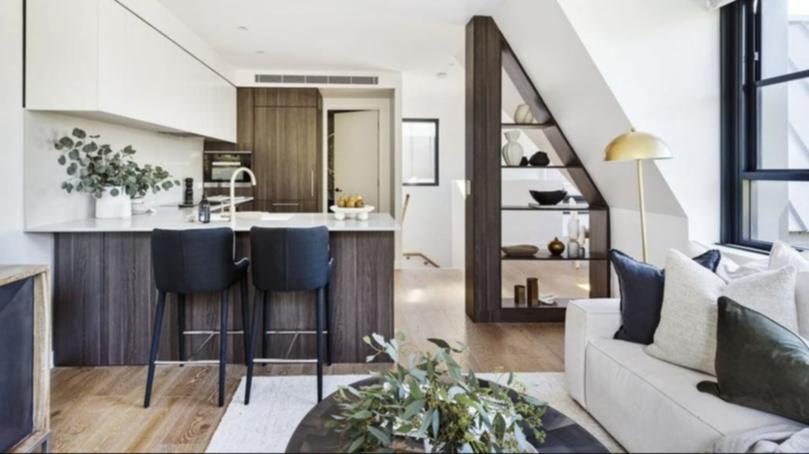 The kitchen and living space in the stunning apartment.