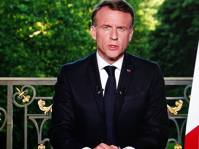 This screen shot shows France's President Emmanuel Macron speaking during a televised address to the nation during which he announced he is dissolving the National Assembly, French Parliament lower house, and calls new general elections on June 30, in Paris on June 9, 2024. (Photo by Ludovic MARIN / AFP)