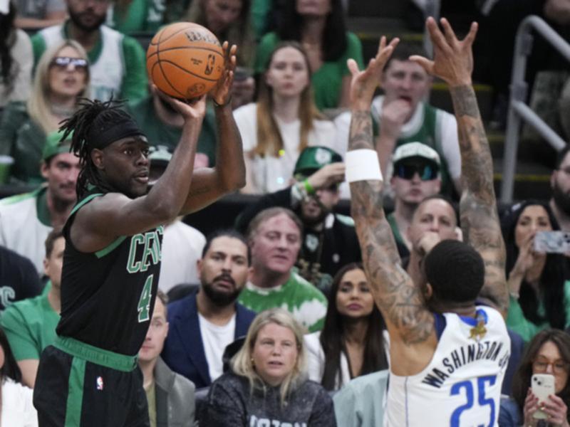 Boston Celtics guard Jrue Holiday takes a shot.