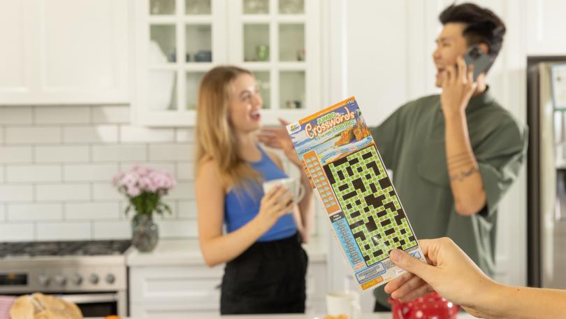 The Beenleigh woman couldn’t believe her eyes when she scratched the top prize on an Instant Scratch-Its ticket, admitting she almost spilt her cup of tea in the heat of the moment.