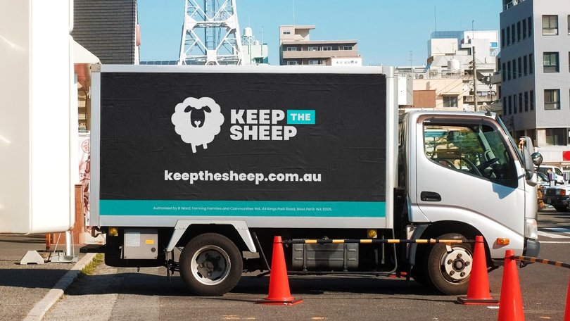 A "Keep the Sheep" billboard on a truck protests the Government's policy to phase out live sheep exports by May 2028.~|~|D8nHIIkkOu