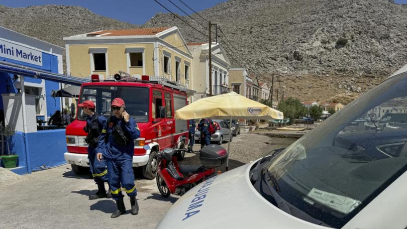 Fire brigade personnel in the search for Michael Mosley on Symi