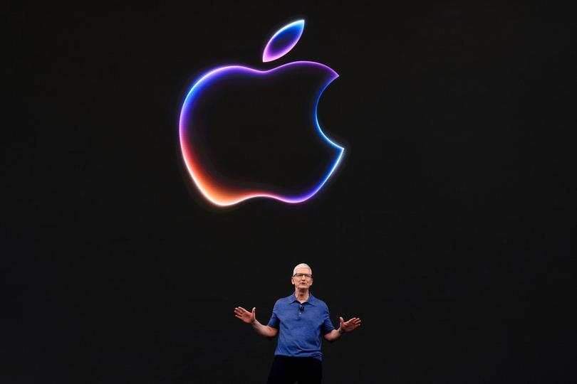 Apple CEO Tim Cook speaks during an announcement of new products on the Apple campus.