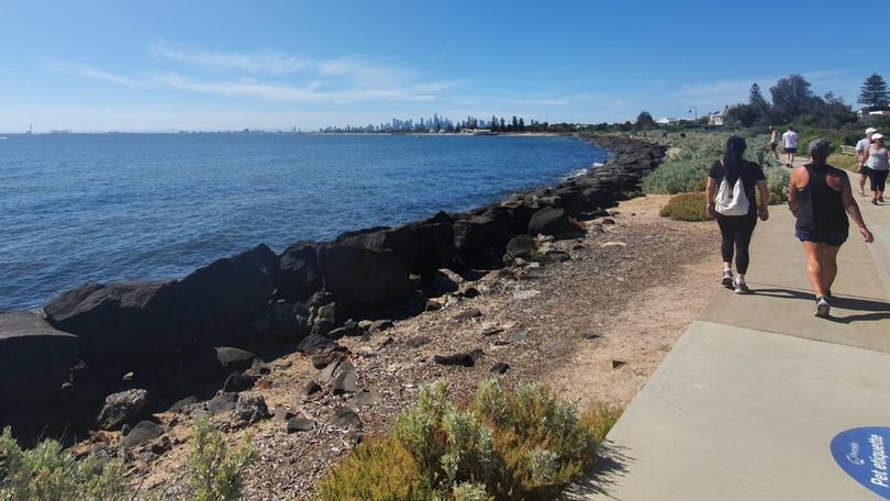 A 51-year-old man has been charged after allegedly exposing himself to young children at Brighton Beach.