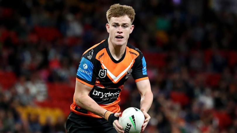 Clubs hoping to lure under-contract half Lachlan Galvin away from Wests Tigers have been warned. (Jason O'BRIEN/AAP PHOTOS)