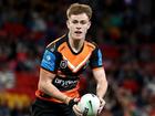 Clubs hoping to lure under-contract half Lachlan Galvin away from Wests Tigers have been warned. (Jason O'BRIEN/AAP PHOTOS)