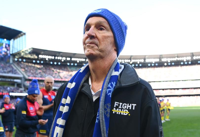 MELBOURNE, AUSTRALIA - JUNE 12: Neale Daniher walks through a guard of honour from Demons and Magpies players ahead of  the round 13 AFL match between Melbourne Demons and Collingwood Magpies at Melbourne Cricket Ground, on June 12, 2023, in Melbourne, Australia. (Photo by Quinn Rooney/Getty Images)