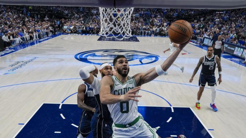 Jayson Tatum (0) was a standout for the Celtics as they moved to within a game of the NBA title. (AP PHOTO)
