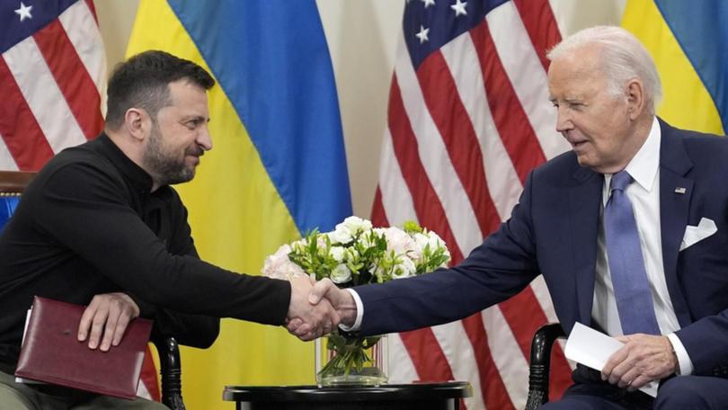 The presidents of Ukraine and the US have signed a 10-year defence pact. (AP PHOTO)