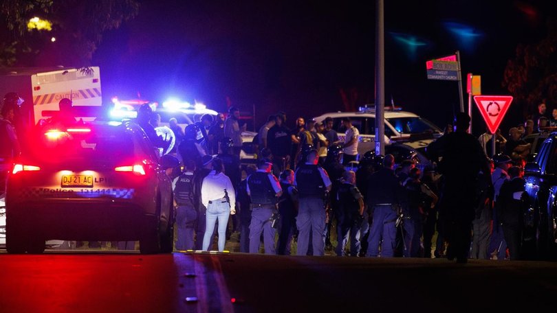 Police estimate about 2000 people descended on the church following the stabbing. (Paul Braven/AAP PHOTOS)