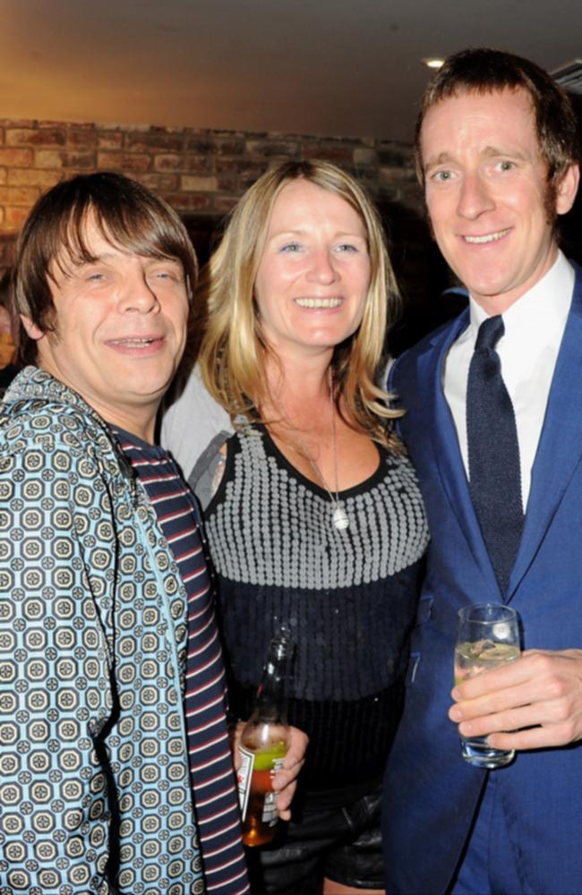 Mani with his wife Imelda and Bradley Wiggins