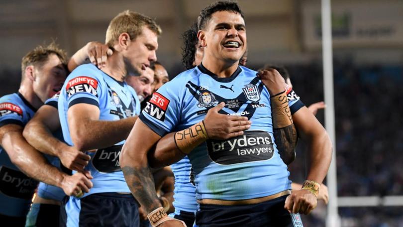 Latrell Mitchell (centre) has been recalled to the NSW side for State of Origin II. (Darren England/AAP PHOTOS)