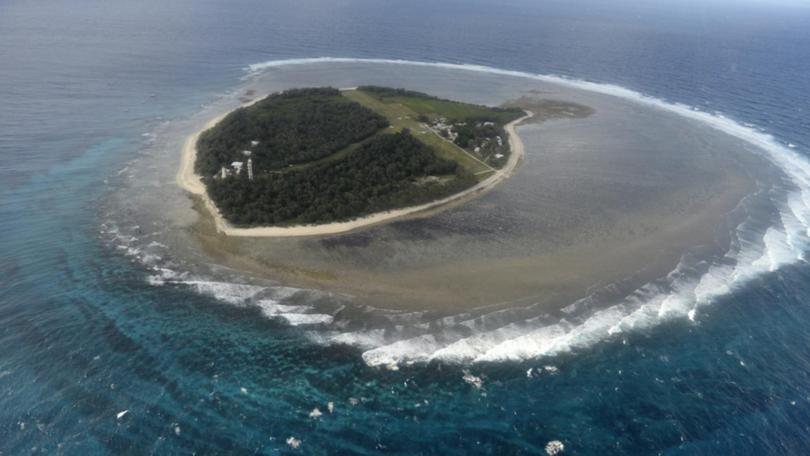A man has died after a yacht capsized off Queensland's Lady Elliott Island. 