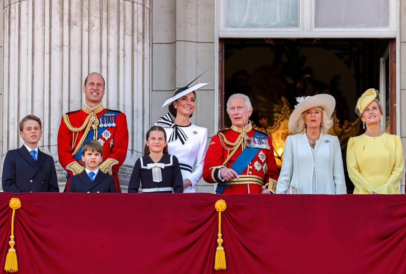 The Royal Family stand on the balcony at Buckingham Palace.