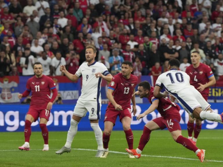 England's Jude Bellingham (10) heads home the only goal of the game to defeat Serbia.