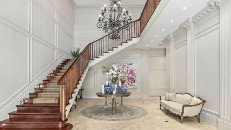 The place to be seen, a grand staircase in this Bowral Mansion which is on part of the Milton Park estate.