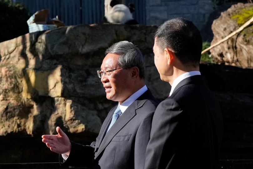 ADELAIDE, AUSTRALIA - JUNE 16: China's Premier Li Qiang gestures while speaking in front of the panda enclosure at Adelaide Zoo on June 16, 2024 in Adelaide, Australia. Li's visit to Australia aims to strengthen bilateral ties and address outstanding trade and consular issues, including the removal of remaining trade barriers and the release of imprisoned Australian democracy blogger Yang Hengjuno, marking a significant step towards stabilizing the relationship between the two nations. The visit also highlights the growing importance of economic cooperation and the need for dialogue on security concerns, particularly in the context of China's increasing influence in the Pacific region. The visit marks the first high-level diplomatic by a Chinese leader to Australia since 2017. (Photo by Asanka Ratnayake/Getty Images)