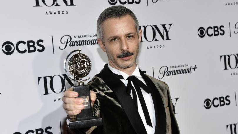 Jeremy Strong with the award for best performance by an actor in a leading role in a play for An Enemy of the People.