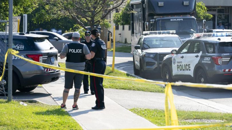 Police are investigating after two people were shot dead at an office space in Toronto, Canada.