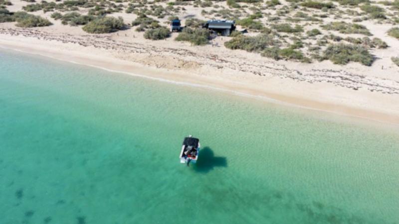 The family love to explore the ocean in their boat.