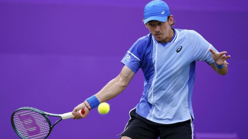 Australian No.1 Alex de Minaur has suffered a shock first round loss at Queen's to Lorenzo Musetti.