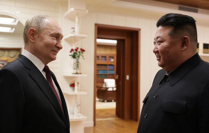 Russia's President Vladimir Putin (L) and North Korean leader Kim Jong-un during a meeting. 