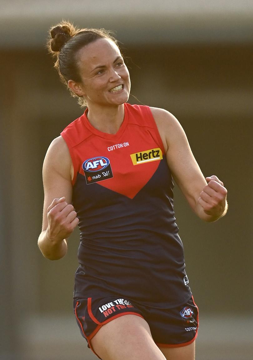 MELBOURNE, AUSTRALIA - MARCH 12: Daisy Pearce of the Demons celebrates kicking a goal during the round 10 AFLW match between the Melbourne Demons and the Carlton Blues at Casey Fields on March 12, 2022 in Melbourne, Australia. (Photo by Quinn Rooney/Getty Images)