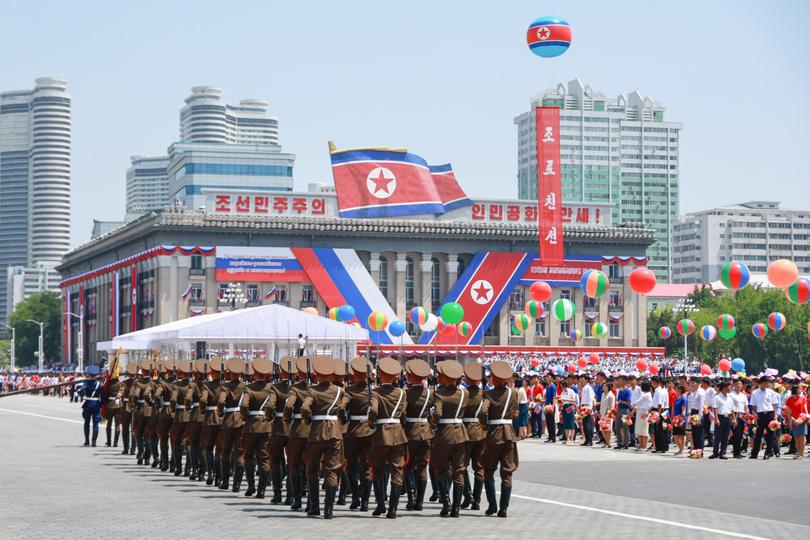 Servicemen march in formation during an official ceremony in Kim Il-sung Square to welcome Putin on a state visit. 