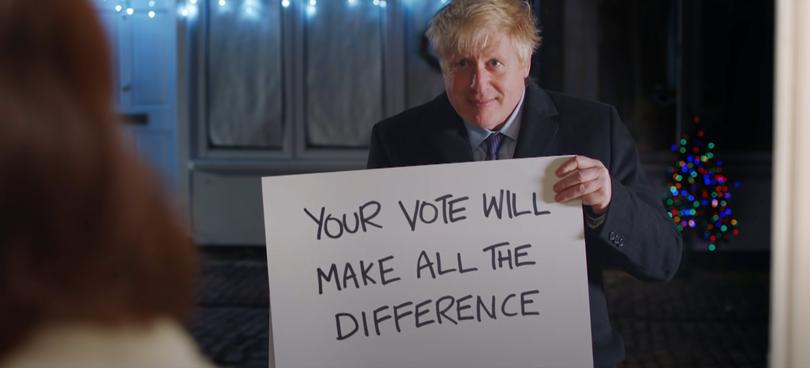 Screengrab taken from a Conservative Party campaign advert that features Prime Minister Boris Johnson emulating a scene from the 2003 Christmas film Love Actually.