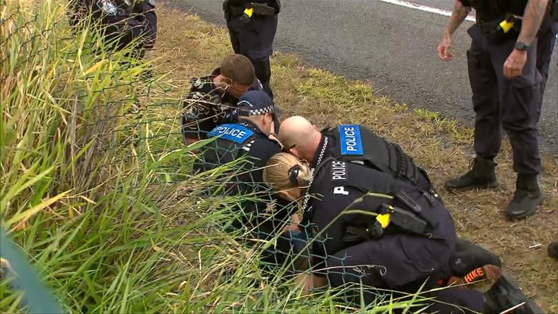 Police arrested the man on the side of the road after he jumped out of the truck as it ran out of fuel.