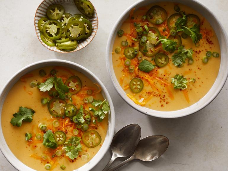 Potato-cheddar soup with quick-pickled jalapenos, in New York, Jan. 19, 2021. Silky-smooth and simple to make, it gets verve and heat from homemade pickled jalapenos. Food styled by Barrett Washburne. (Christopher Simpson/The New York Times)