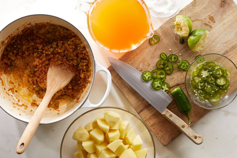 Ingredients for potato-cheddar soup with quick-pickled jalapeños, in New York, Jan. 19, 2021. Silky-smooth and simple to make, it gets verve and heat from homemade pickled jalapeños. Food styled by Barrett Washburne. (Christopher Simpson/The New York Times)