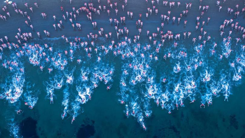 Dark Mofo's nude winter solstice swim has expanded to 3000 participants due to increased demand. (Rob Blakers/AAP PHOTOS)