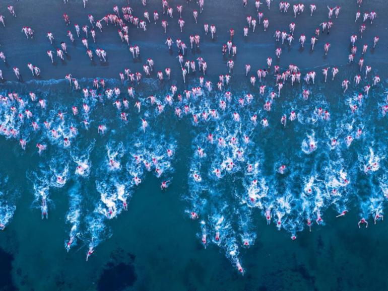 Dark Mofo's nude winter solstice swim has expanded to 3000 participants due to increased demand. (Rob Blakers/AAP PHOTOS)