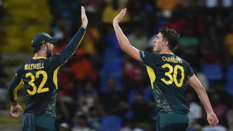 A hat-trick from Pat Cummins helped put Australia on the path to victory over Bangladesh. (AP PHOTO)