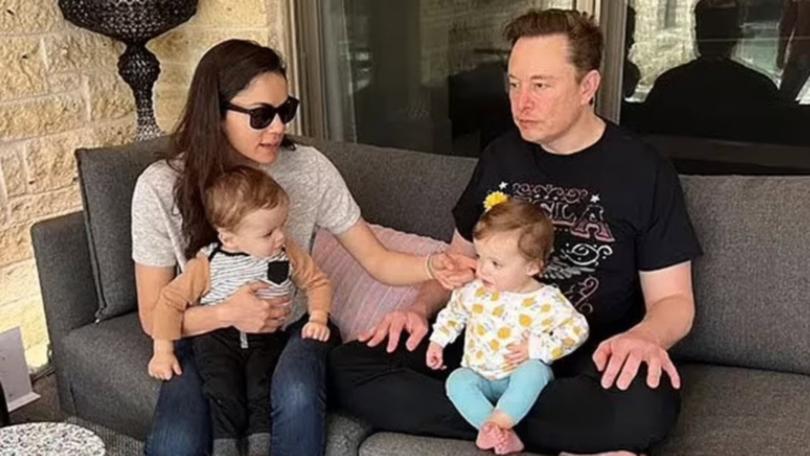 Elon Musk pictured with his twins Strider and Azure, born in November 2021, and Shivon Zilis.