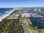 A man has been critically injured in a dinghy crash with a yacht on the Gold Coast.