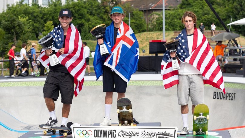 Australian skateboarder Keegan Palmer (centre) claimed gold in the men's park event in Budapest.