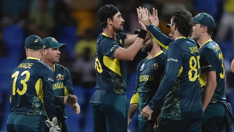 Mitchell Starc (centre) was dropped against Afghanistan, but may earn a recall against India. (AP PHOTO)
