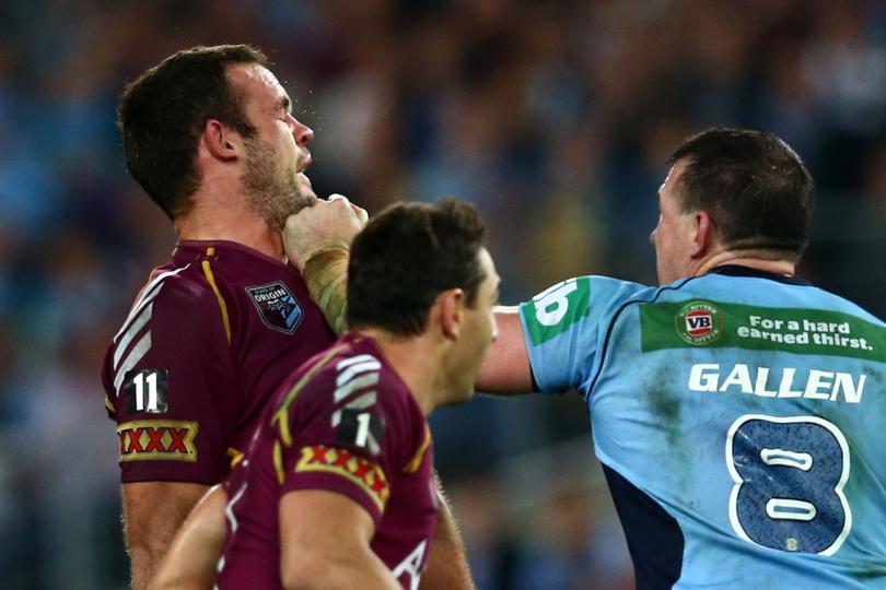 SYDNEY, AUSTRALIA - JUNE 05:  Paul Gallen of the Blues punches Nate Myles of the Maroons during game one of the ARL State of Origin series between the New South Wales Blues and the Queensland Maroons at ANZ Stadium on June 5, 2013 in Sydney, Australia.  (Photo by Mark Kolbe/Getty Images)