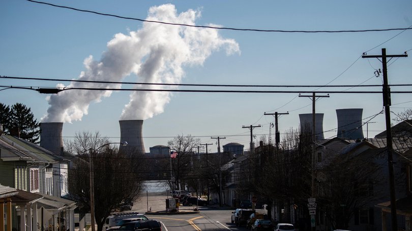Steam rises out of the nuclear plant on Three Mile Island.