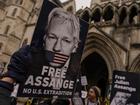 Julian Assange was charged with conspiracy to obtain and disclose national defence information. (AP PHOTO)