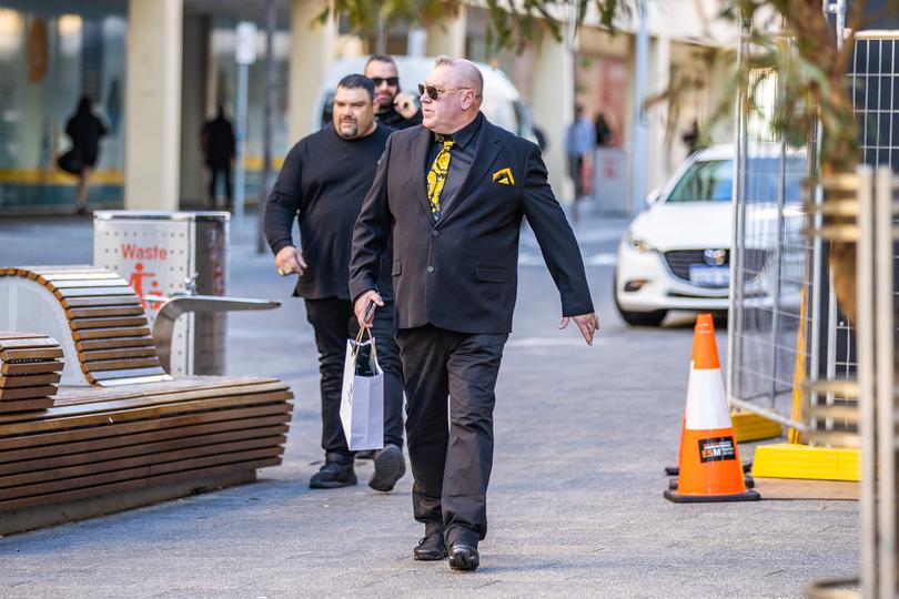 Karl Labrook enters Perth Magistrates Court on Monday morning.