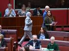 Labor Senator Fatima Payman (centre) crosses the floor in the Senate. 