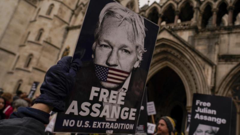 Julian Assange was charged with conspiracy to obtain and disclose national defence information. (AP PHOTO)